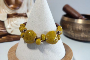 Bijoux de corallie bracelet 2 coeurs jaunes